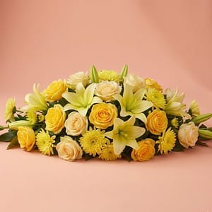 Funeral arrangement yellow/cream